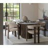 Gallery Direct Onda walnut extending dining table in modern dining room with contemporary seating