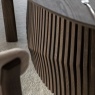 Slatted wave base detail on Gallery Direct Onda walnut extending dining table
