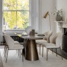 Gallery Direct Bresso bronze extending dining table displayed in modern dining room interior