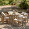Modern Madeira 6-seater garden furniture set styled on a patio with a rectangular acacia wood table.