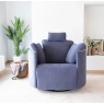 Fama Moonrise Big oversized power recliner in blue fabric in lounge next to plant - front view