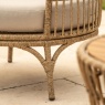 Close-up of the Agadir armchair showing the intricate 9mm brown weave pattern and the sturdy steel frame legs.