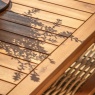 Detailed view of the Belize coffee table's slatted acacia wood top, highlighting the natural grain and weather-resistant fini