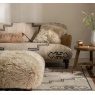 Tetrad Nappa Rectangular Sheepskin Stool in living room